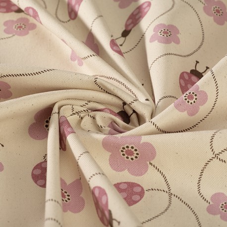 Sergé de coton bio écru imprimé coccinelles